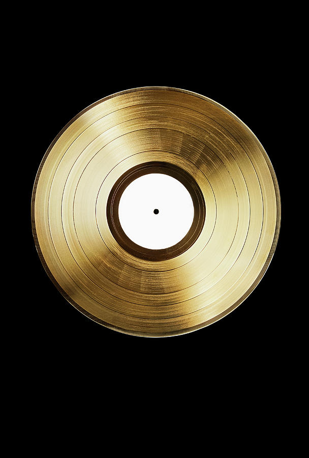 a-gold-record-on-a-black-background-larry-washburn